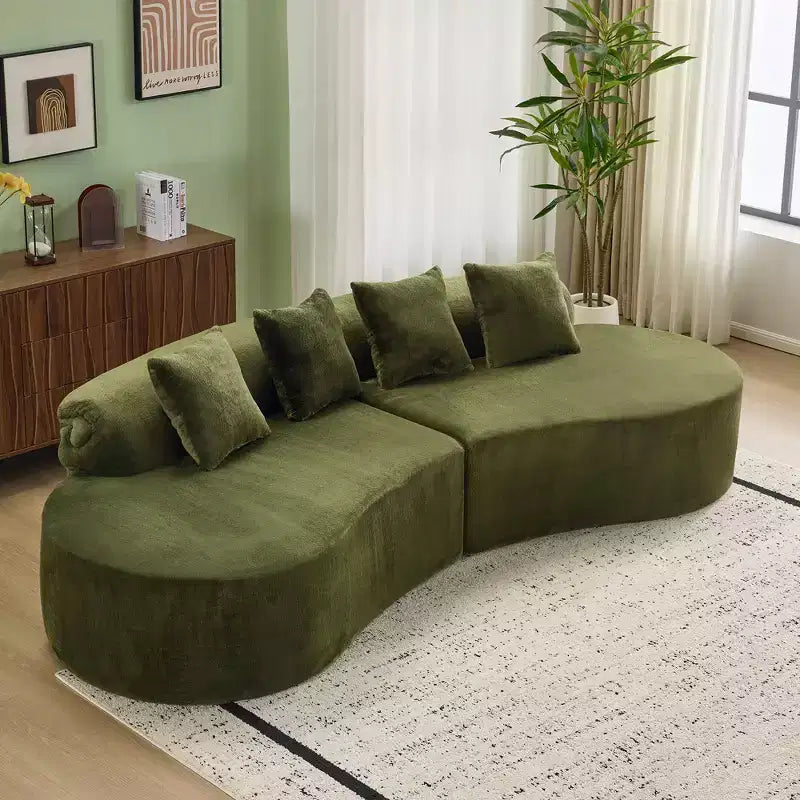Modern and simple curved flannelette sofa. Creative multi-seater for the living room, with a combination of pillows.