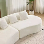 Modern and simple curved flannelette sofa. Creative multi-seater for the living room, with a combination of pillows.