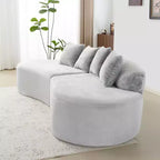 Modern and simple curved flannelette sofa. Creative multi-seater for the living room, with a combination of pillows.