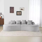 Modern and simple curved flannelette sofa. Creative multi-seater for the living room, with a combination of pillows.