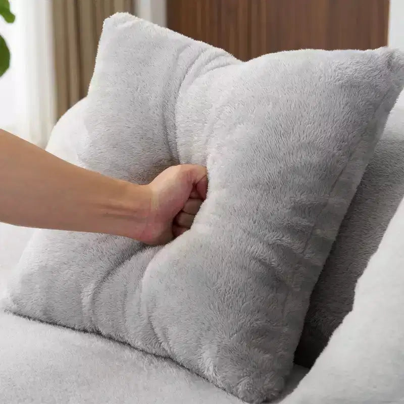 Modern and simple curved flannelette sofa. Creative multi-seater for the living room, with a combination of pillows.