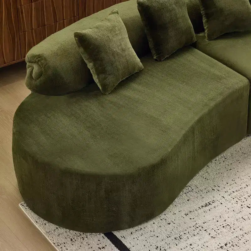Modern and simple curved flannelette sofa. Creative multi-seater for the living room, with a combination of pillows.