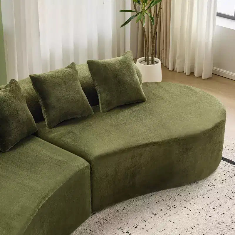 Modern and simple curved flannelette sofa. Creative multi-seater for the living room, with a combination of pillows.
