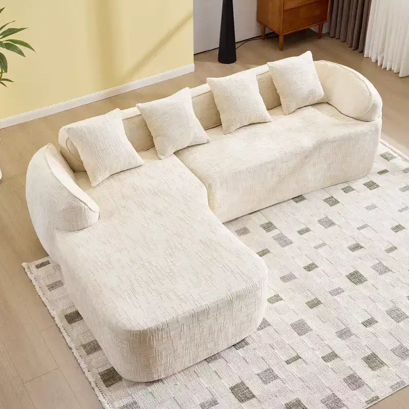 Canapé d'angle en chenille beige avec accoudoirs arrondis et 4 coussins Neutre, Douillet, Gain de place
