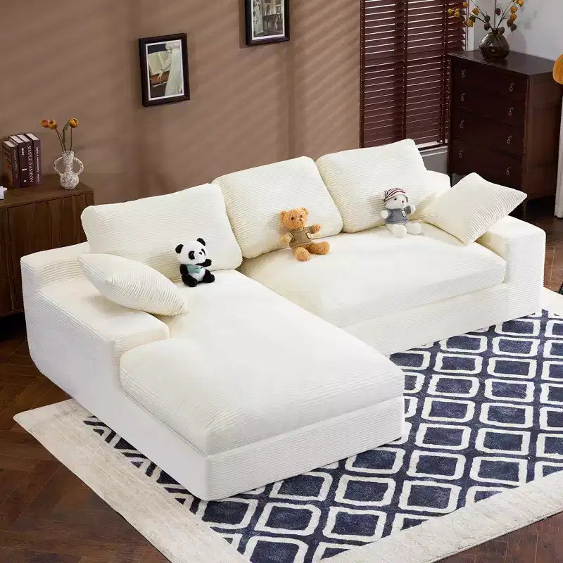 Canapé confortable en velours côtelé blanc avec 5 coussins – L'indispensable du salon douillet