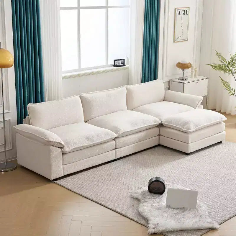 Canapé d'angle moderne Karl Home Chellie 3 places en L blanc avec accoudoirs rembourrés et pouf (305 cm de large)