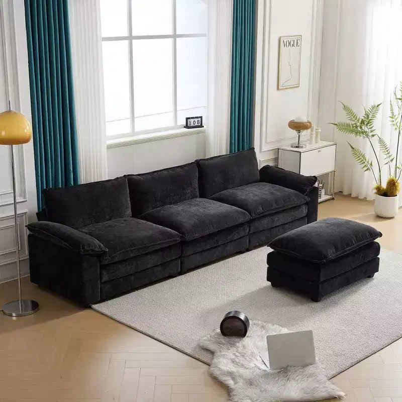 Karl Home | Canapé d'angle moderne Chellie 3 places en L avec accoudoirs et plateau capitonné, 305 cm de large, noir, avec pouf