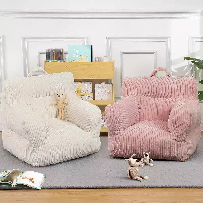 Canapé-poire en velours côtelé rose avec coussin moelleux, un siège de sol douillet pour les chambres et les salles de jeux. Conception souple et offrant un bon maintien, avec poignées pour un transport facile.