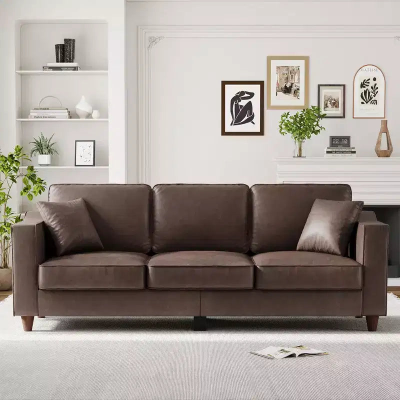 Canapé 3 places en similicuir avec 2 coussins, Canapé moderne à assise profonde, Accoudoirs larges et pieds en bois, Meuble de soutien robuste pour salon, bureau