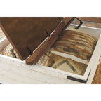 Signature Design by Ashley Wystfield Antiqued Ivory and Brown Pine Coffee Table