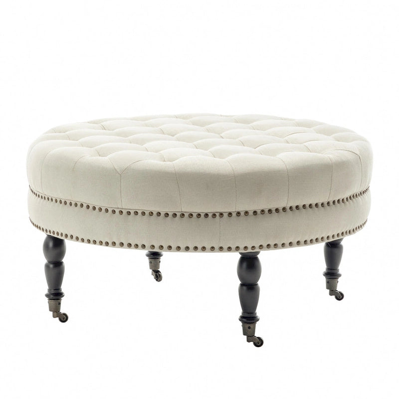 Porthos Home Indy Fabric Round Cocktail Ottoman with Rubberwood Legs and Wheels