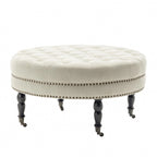Porthos Home Indy Fabric Round Cocktail Ottoman with Rubberwood Legs and Wheels