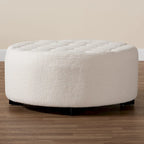 Athena Modern and Contemporary Ivory Boucle Upholstered and Black Finished Wood Round Ottoman
