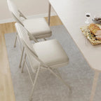 Lot de 4 chaises pliantes avec coussin et dossier rembourrés, supportent jusqu'à 158 kg